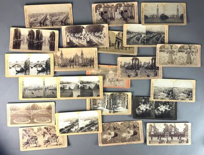 many old photographs of people and buildings on the wall