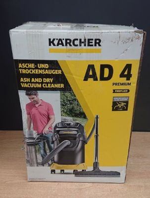 la boîte d'un aspirateur est posée sur une table