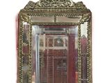 a mirror hanging on the wall in a room