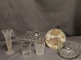 a lot of glass items that are on a table