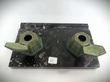 two green vases sitting on top of a black table