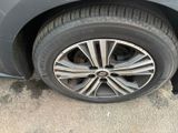 a close up of a tire on a car ' s rim