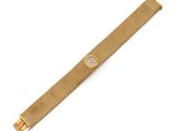 a gold watch with a mesh band on a white background
