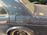 a car that has been left in the garage with the door open