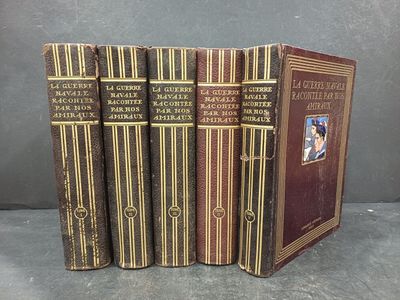 quatre livres sont empilés sur une table