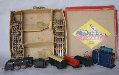 a box with a train set in it on a table