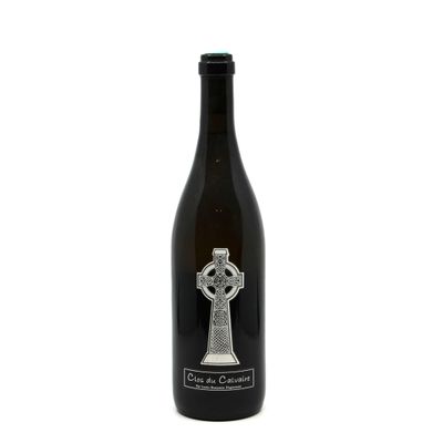 a bottle of wine with a celtic cross on it