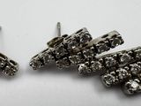 pair of silver tone rhine stud earrings on a white surface