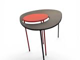 an image of a table with a red top and black legs