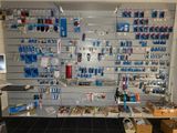 many items on the wall in the store