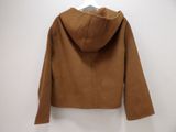 the back of a brown jacket hanging on a white hanger