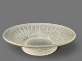 an image of a glass bowl with a decorative design on the rim