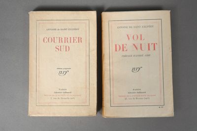 pair of two books sitting on top of a table next to each other