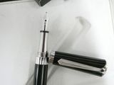 a pen that is laying on top of a table