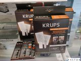 deux boîtes de Krups exposées dans un magasin