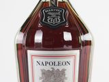 a bottle of liquor that is sitting on a table
