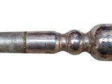 a close up of a metal pipe on a white background