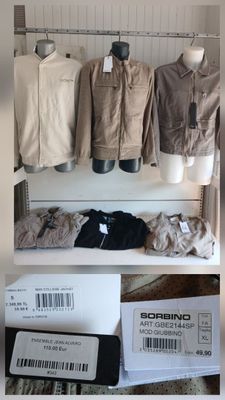 a picture of a display of clothing on a shelf