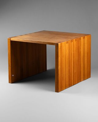 an image of a wooden table on a grey background