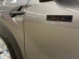 a close up of a car door with a sticker on it