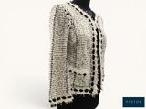 a black and white jacket on a mannequin mannequin mannequin mannequin mannequin mannequin mannequin mannequin mann