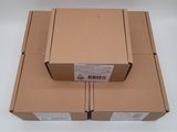 two boxes are stacked on top of each other on a white surface
