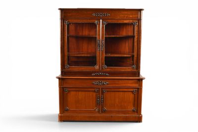 a wooden cabinet with two doors and two drawers