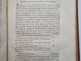 an open book with a picture of a cat on it ' s cover