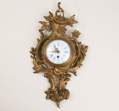 a clock hanging on the wall in a room