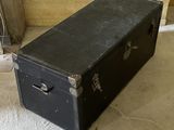 a black suitcase sitting on the floor in a room