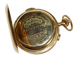 an image of a gold pocket watch on a white background