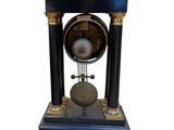 a clock that is sitting on top of a table