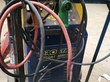 a small cart with a bunch of wires attached to it