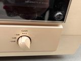 someone is taking a picture of a microwave with their reflection in the oven door