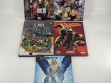 the x - men comic books are lined up on a white surface
