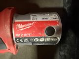 a close up of a milwaukee milwaukee m12 hpt drill