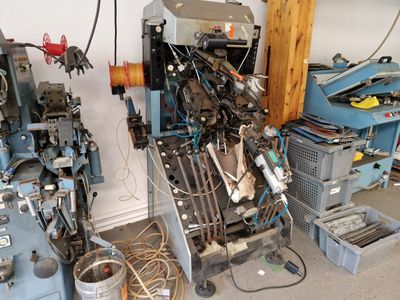 a machine that is sitting in a room next to other machines