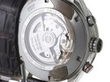 a close up of a watch on a white background