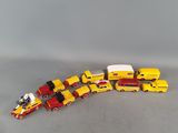 a lot of toy trucks that are lined up together