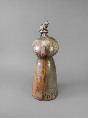 an image of a statue of a woman with a bird on top of her head
