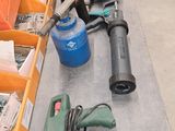 a lot of tools that are sitting on the floor