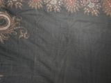 an image of a close up of a black and red scarf