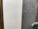 a picture of a picture of a man sitting on a chair