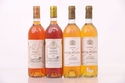 trois bouteilles de vin posées l'une à côté de l'autre sur une table
