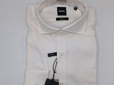 a close up of a white shirt with a tag on it