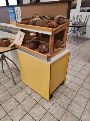 a display of bread and pastries in a bakery