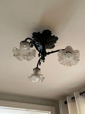 a light that is hanging from the ceiling in the room