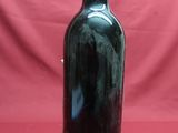 a bottle of wine that is sitting on a table
