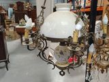 an image of a room filled with lots of antique lamps