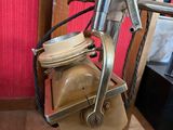 a machine that is sitting on top of a wooden table